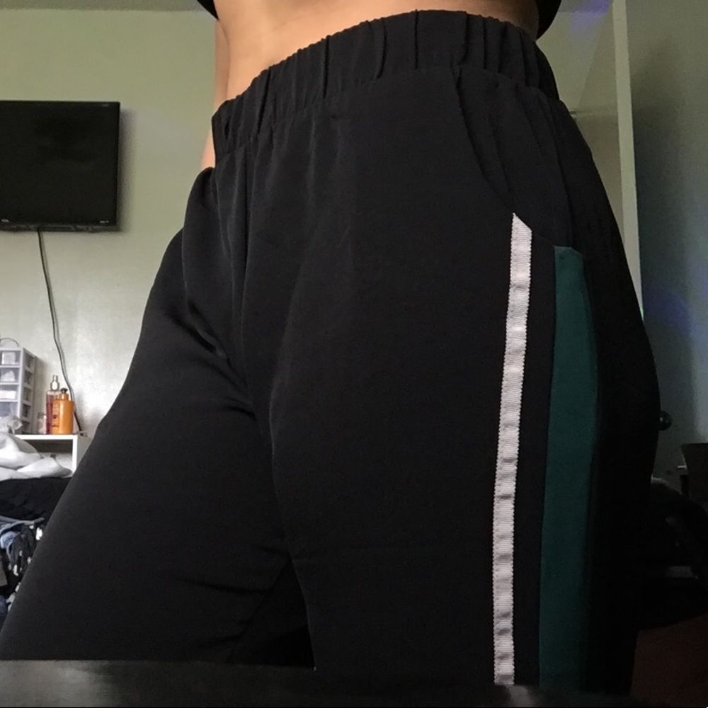Track-like pants with light flared bottoms